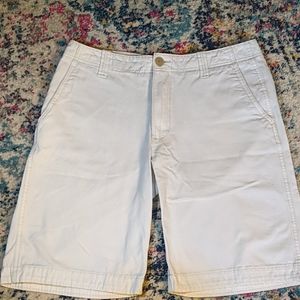 White flat front short